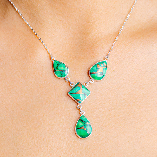Green turquoise teardrop pendant necklace with silver chain and five linked drops