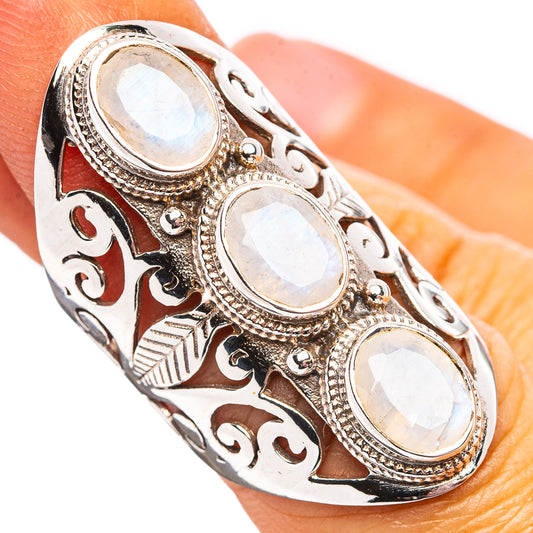 Oval moonstone sterling silver ring with ornate filigree and engraved scrollwork, size 6.25