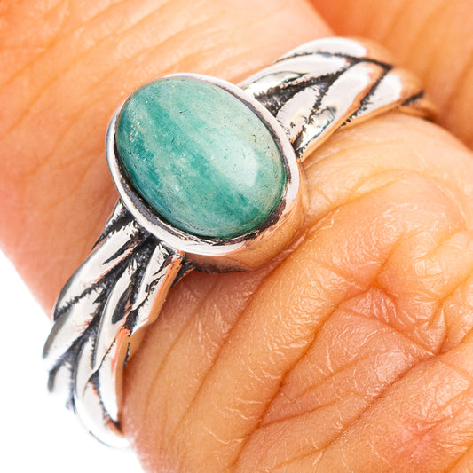 Sterling silver ring with oval turquoise amazonite cabochon, close-up.