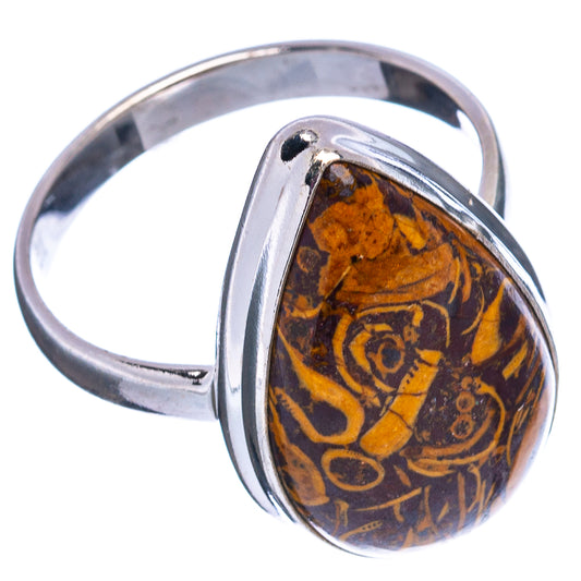 Sterling silver oval fossil ring with amber-and-brown swirl inlay, size 11, side view