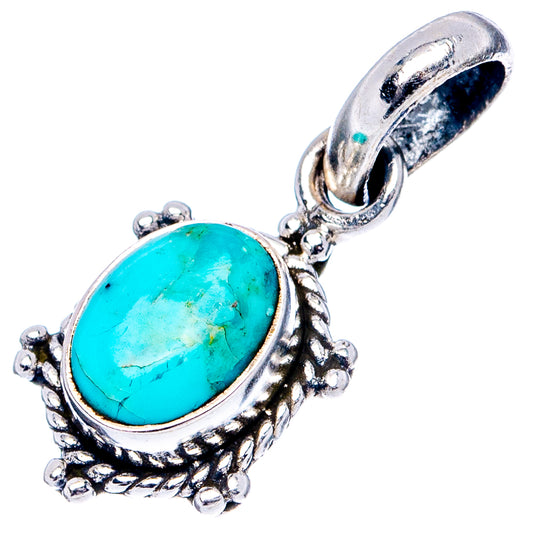Oval turquoise cabochon sterling silver pendant charm with raised frame and side beads