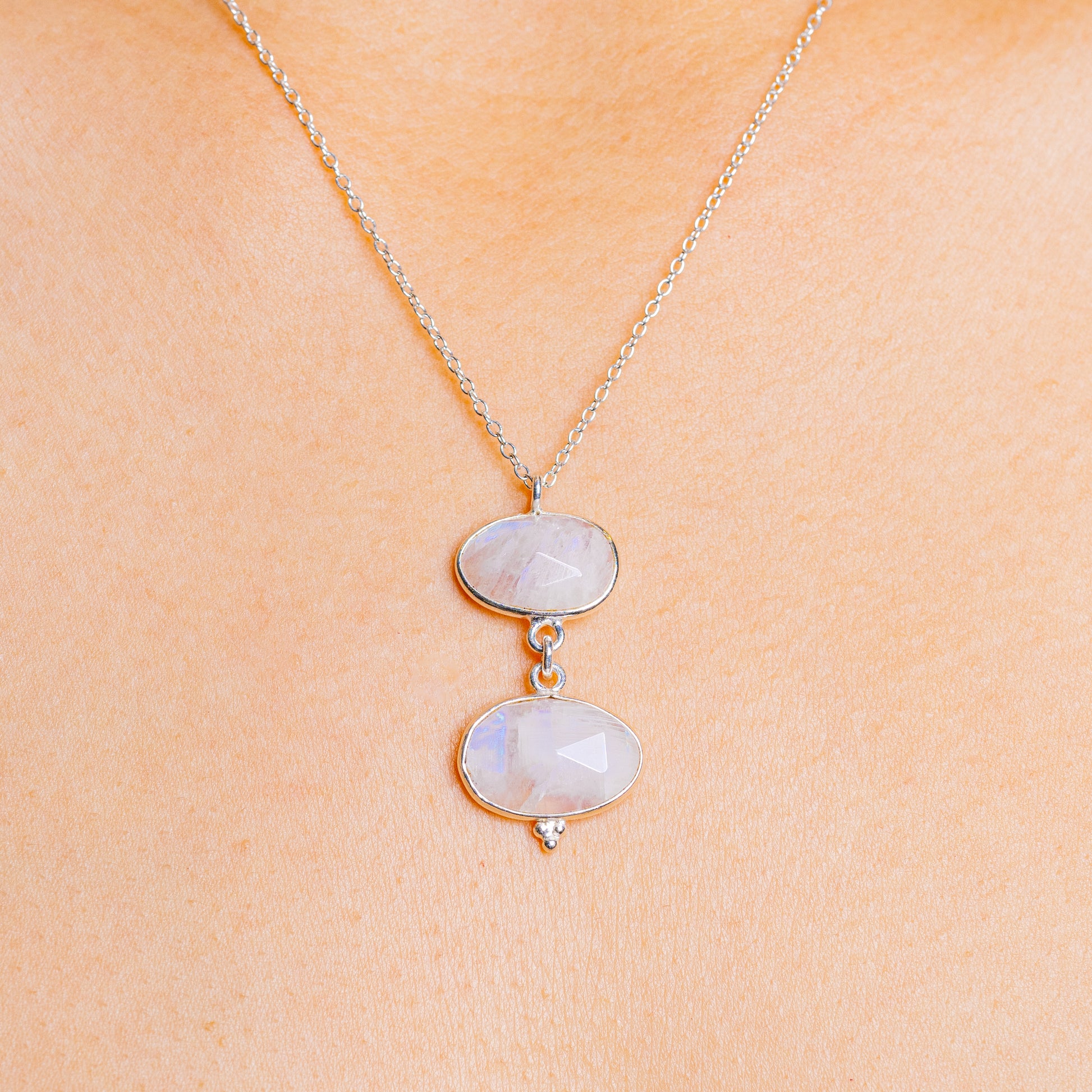 Sterling silver necklace with two oval rainbow moonstone pendants