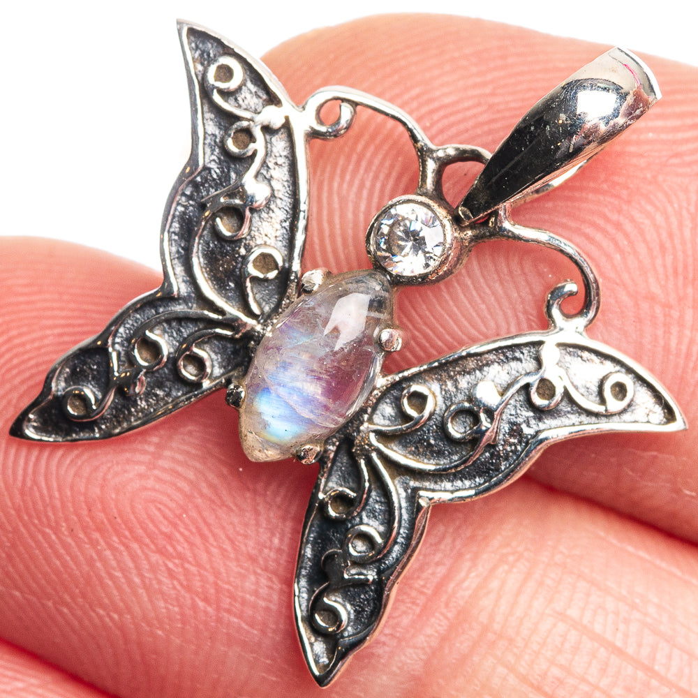 925 sterling silver moonstone pendant with opalescent center stone and filigree wing details