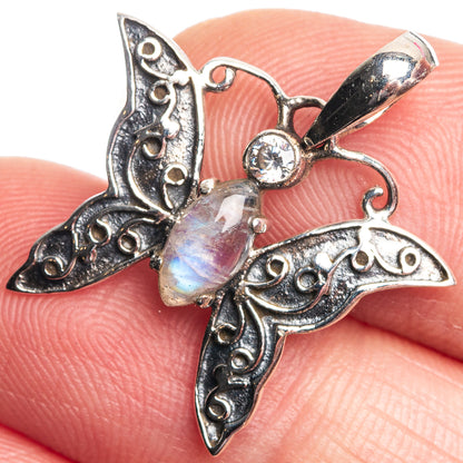 925 sterling silver moonstone pendant with opalescent center stone and filigree wing details
