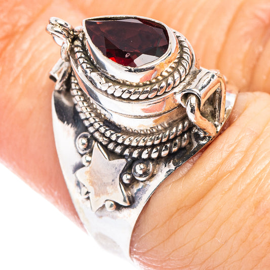 Sterling silver garnet teardrop poison ring with ornate rope and bead detailing