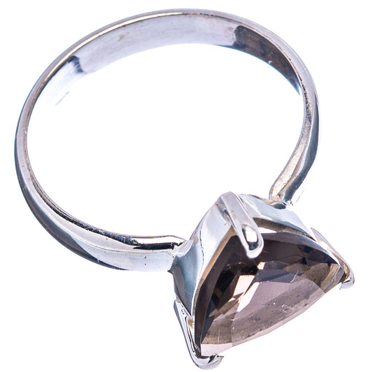 Faceted smoky quartz ring with dark gray gemstone, silver prong setting, open band