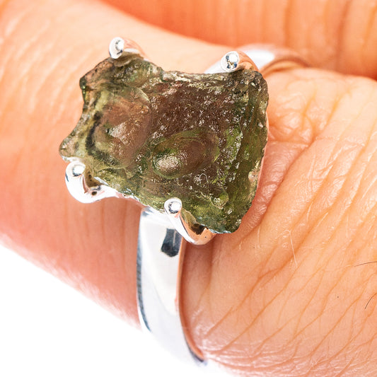 Sterling silver ring with rough green moldavite stone and three prongs