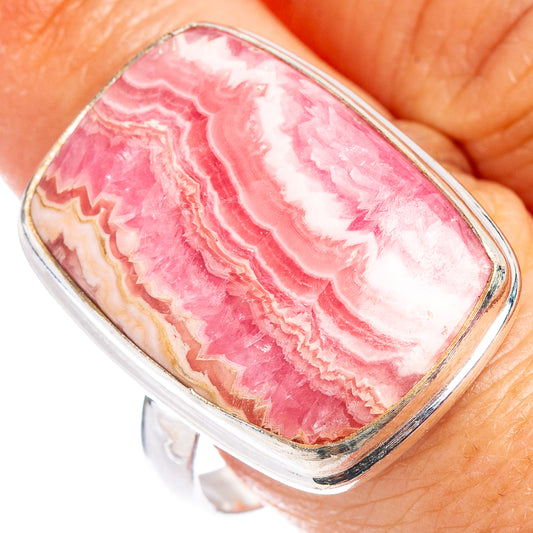 Sterling silver ring with pink rhodochrosite cabochon, silver bezel, ridged edge