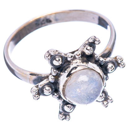Sterling silver ring with oval rainbow moonstone and star-like floral prongs