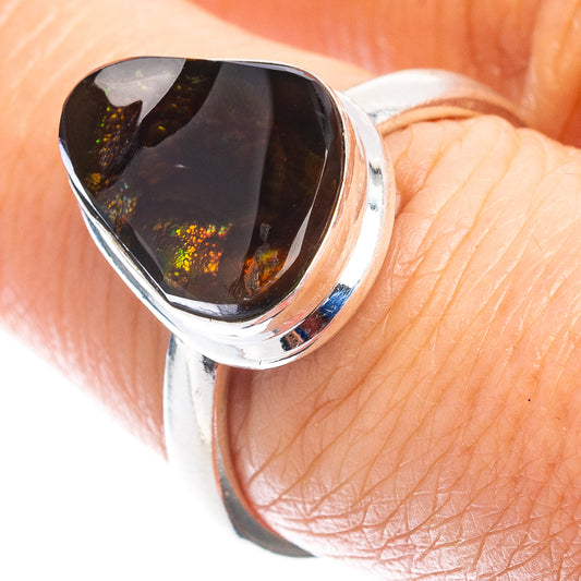 Sterling silver ring with black fire agate teardrop gemstone, fiery orange inclusions