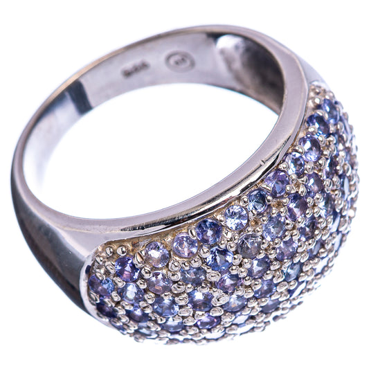 Sterling silver ring with domed blue gemstone band and open interior