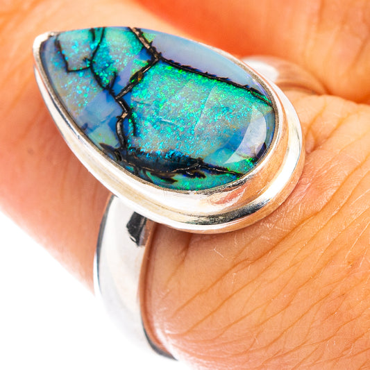Sterling silver opal ring with teardrop blue-green stone and black matrix detail