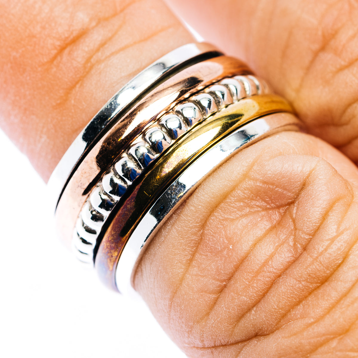 Spinner ring in polished .925 sterling silver, with blue and gold inlay accents; size 6.75