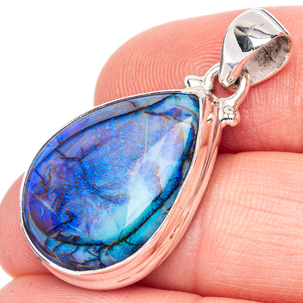 Sterling silver opal pendant with blue teardrop stone and hinged bail detail