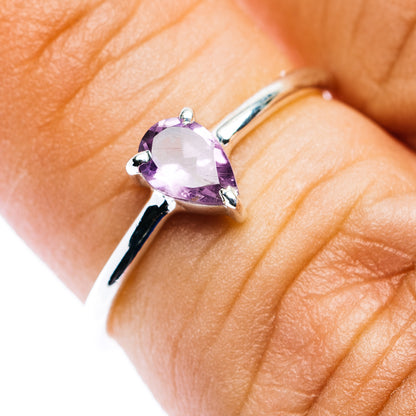 Sterling silver ring with pear-shaped amethyst and prong setting