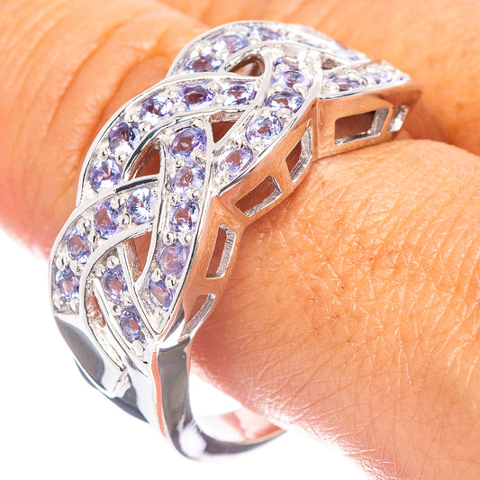 Sterling silver tanzanite ring with faceted blue stones and openwork design
