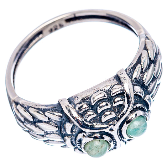 Sterling silver owl ring with leafy etched band and two green cabochon stones