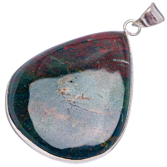 Silver-plated teardrop pendant with marbled dark stone and light gray center