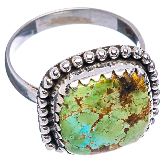 Sterling silver turquoise ring with oval green/blue cabochon in beaded bezel