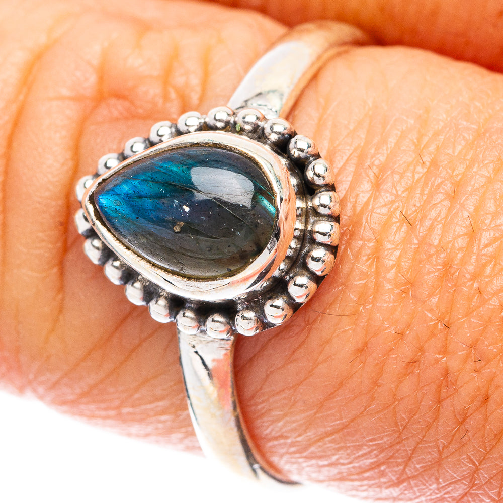 925 sterling silver ring with oval labradorite and beaded halo detail