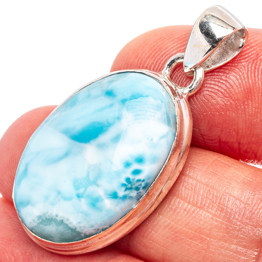 Rare larimar pendant with oval blue stone in .925 sterling silver frame