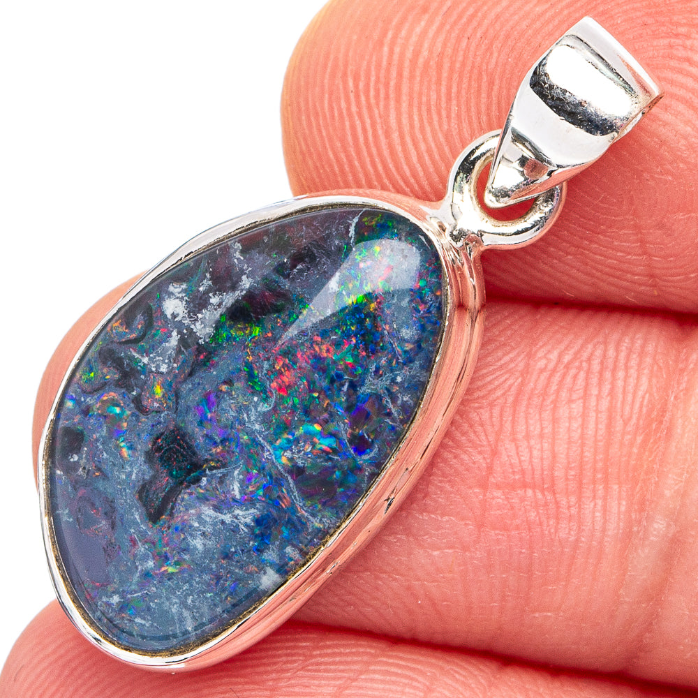 Oval opal pendant with blue-green iridescent stone in .925 sterling silver bezel