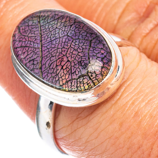 Sterling silver ring with oval purple iridescent leaf opal cabochon