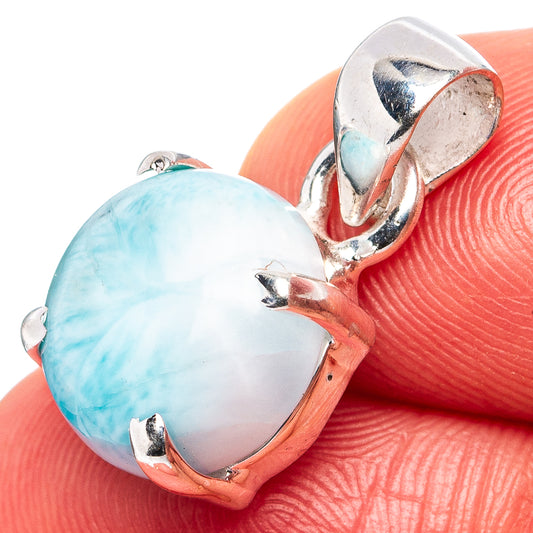Sterling silver larimar teardrop pendant close-up with light blue oval gemstone bezel