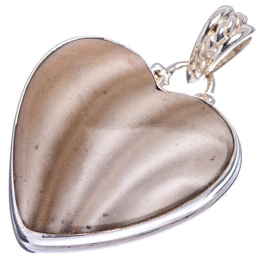 Heart-shaped sterling silver flint pendant with mottled gray stone and loop top
