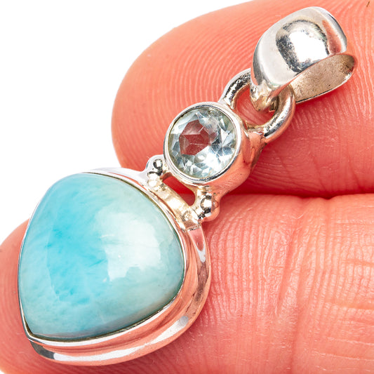 Sterling silver pendant with large oval larimar stone and small light-blue accent gem