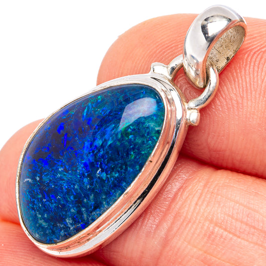 Sterling silver opal pendant with oval blue gemstone and bail loop