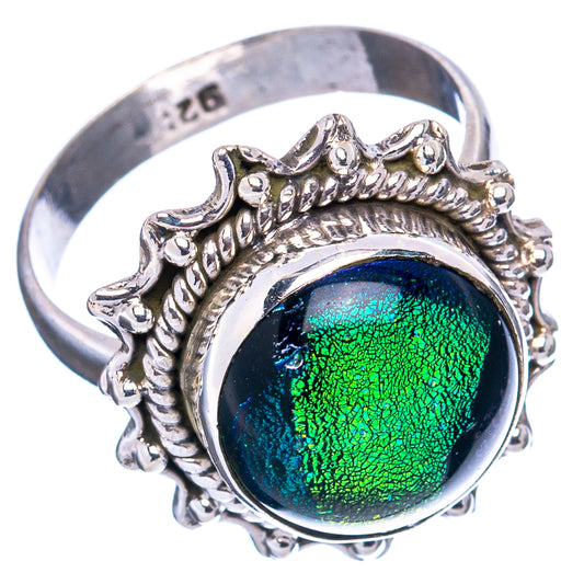 Dichroic glass ring, .925 sterling silver band with ornate scalloped frame and blue-green oval stone.