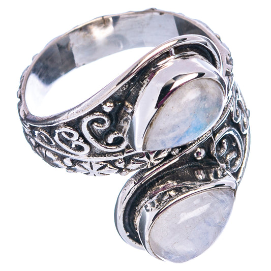 Sterling silver moonstone ring side view with engraved band and oval iridescent stones