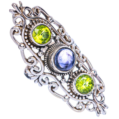 Sterling silver ring with three green peridot and blue kyanite oval cabochons