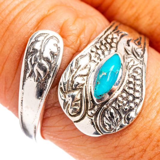 Turquoise cabochon adjustable sterling silver ring with ornate eagle engraving
