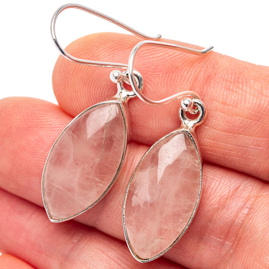 Sterling silver drop earrings with pink rose quartz teardrop stones and hinged hooks