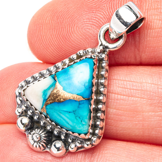 Turquoise teardrop pendant close-up in .925 sterling silver with ornate bead trim and bail