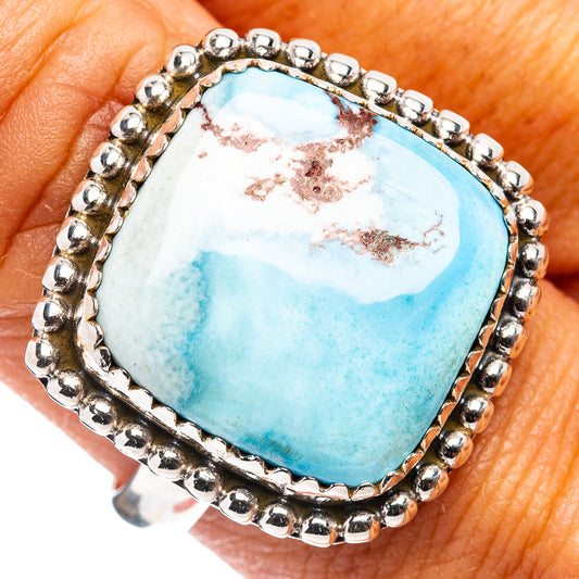 Turquoise cabochon silver ring with beaded bezel and oval setting