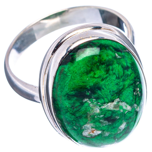 Sterling silver ring with oval green cabochon and rounded raised bezel, side angle