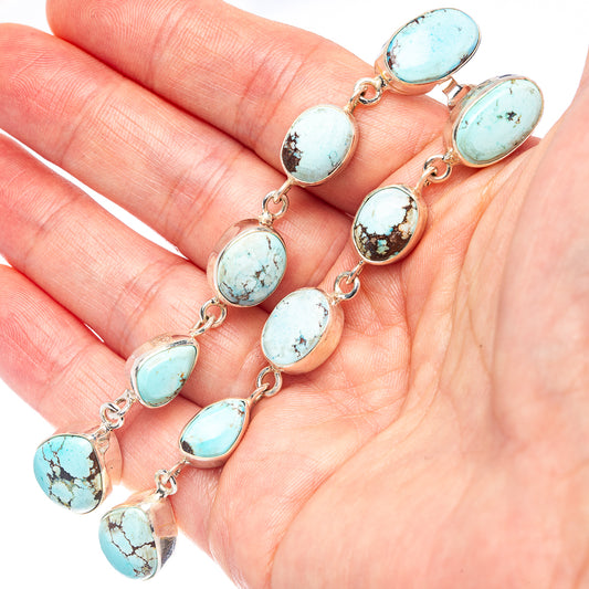 Turquoise oval stone drop earrings in .925 sterling silver with linked chain