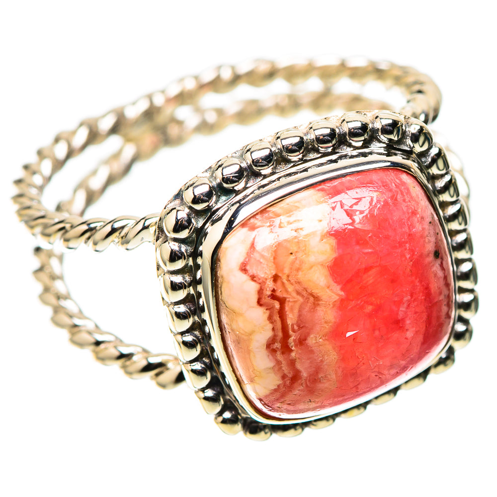Sterling silver ring with oval red-pink stone and bead border, slim band