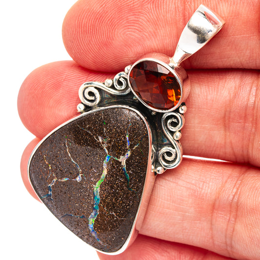 Sterling silver pendant with dark boulder opal teardrop and orange citrine top