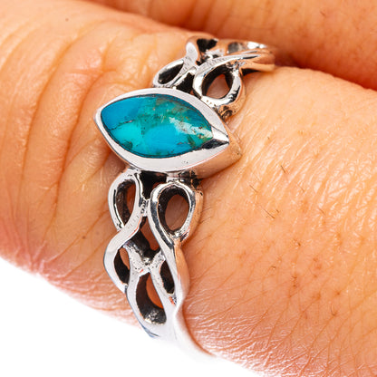 Sterling silver turquoise cabochon ring with ornate openwork side settings