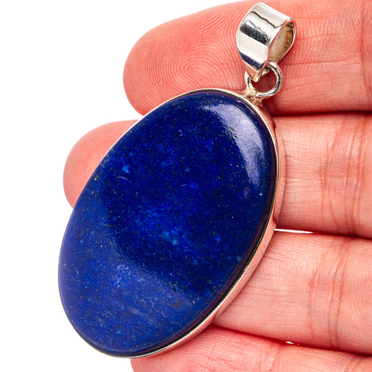 Oval lapis lazuli pendant in .925 sterling silver with top loop bail
