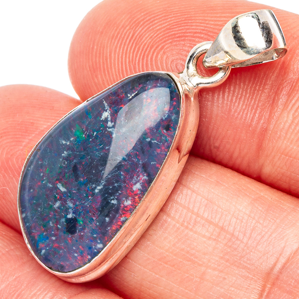 Oval opal pendant in 925 sterling silver with loop bail, showing blue-purple iridescence.