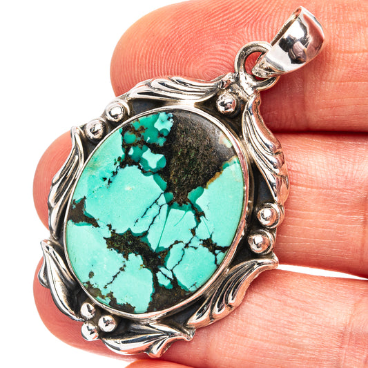 Turquoise oval pendant, ornate .925 sterling silver setting with bail