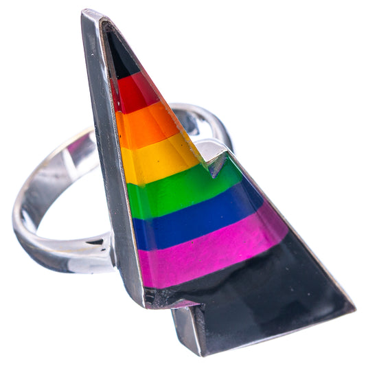 Sterling silver rainbow bolt ring with multicolor stripes on black enamel face.