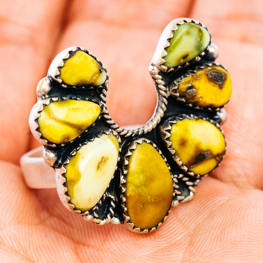 Southwestern style adjustable sterling silver ring, oval yellow-green stones on black bezel