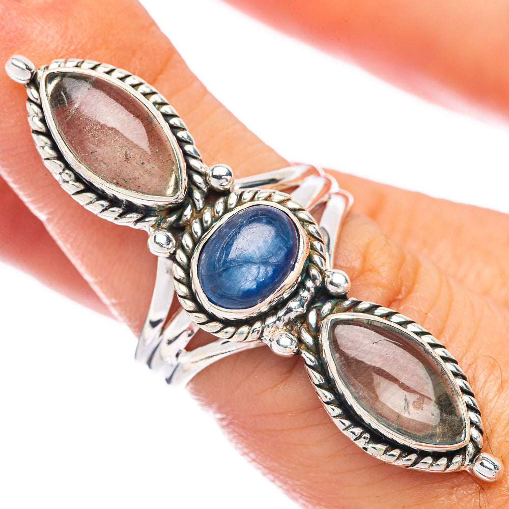 925 sterling silver ring with oval blue center stone and two light oval stones