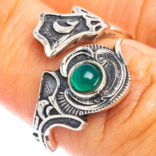 Green gemstone dainty ring with ornate silver filigree and round green center stone